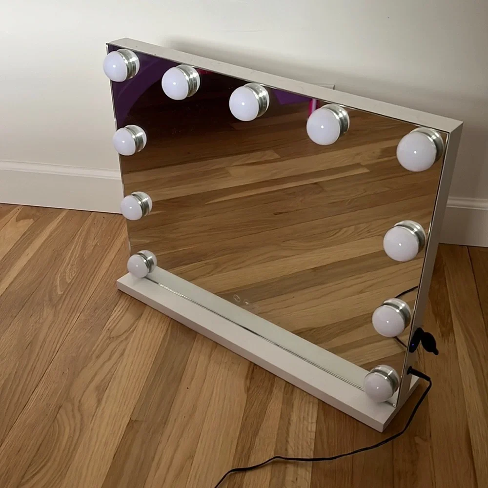 Vanity Mirror. 2 Charging Spots. 3 Light Modes.